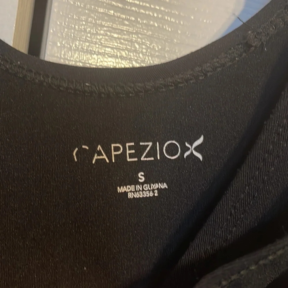 Capezio black sleeveless bodysuit in size small